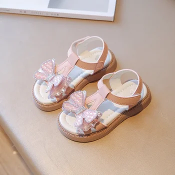 2023 Новый горный хрусталь Галстук-бабочка Детская обувь Сандалии для девочек Летняя обувь Детские сандалии на плоской подошве из-за обуви принцессы от 2 до 8 лет